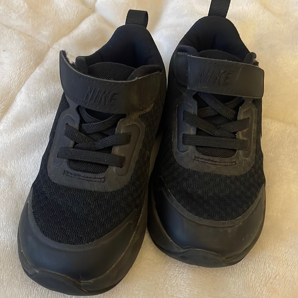 Black toddler Nike sneakers